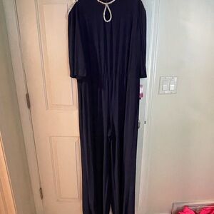 Elegant Blue Jumpsuit with Embellished Neckline